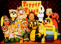 Picture of Mark Nichols with puppets